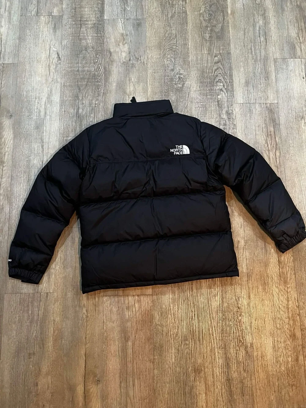The North Face Black Quilted Down Jacket with White Logo
